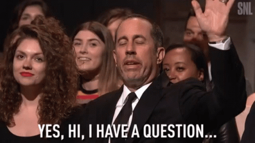 a man in a suit and tie says yes , hi , i have a question .