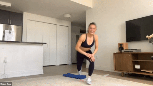 GIF of a woman leading a workout on Zoom chatting with another participant 