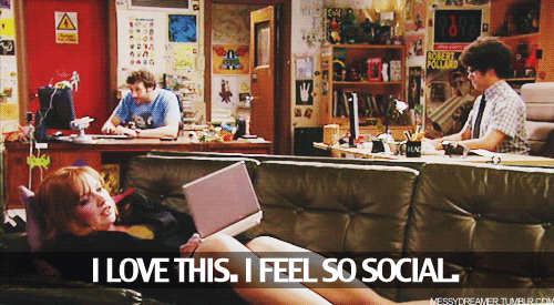 Gif of woman laying on the couch with the caption "I love this. I feel so social."