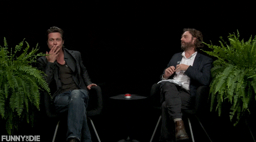 GIF of Brad Pitt at an interview singing "I'll be there for you..." from FRIENDS