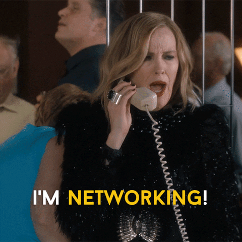 GIF of woman on the phone saying "I'm networking!"