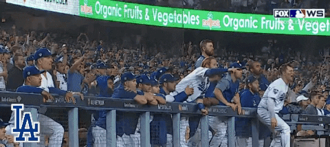 GIF of LA Dodgers players celebrating in the dugout 