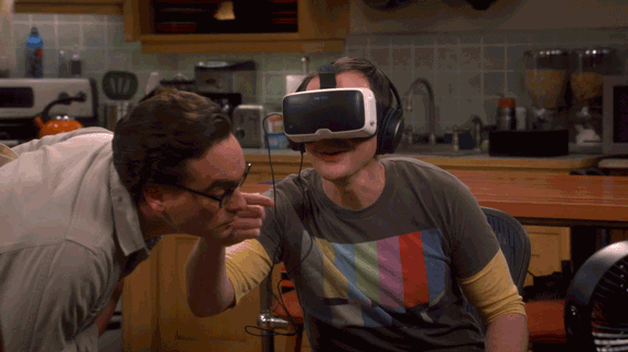 Gif of Sheldon from "the Big Bang Theory" wearing VR goggles and flinching and ripping them off his face.