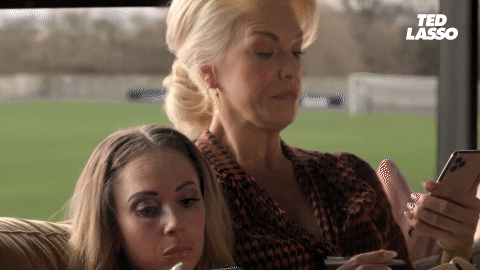 Women sharing features on their mobile apps.