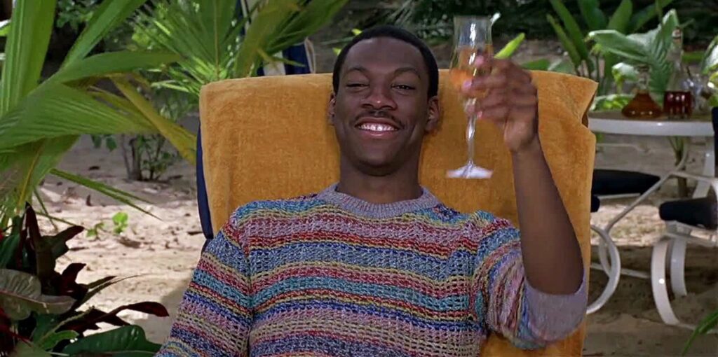 Man cheers with a glass while traveling or on vacation.